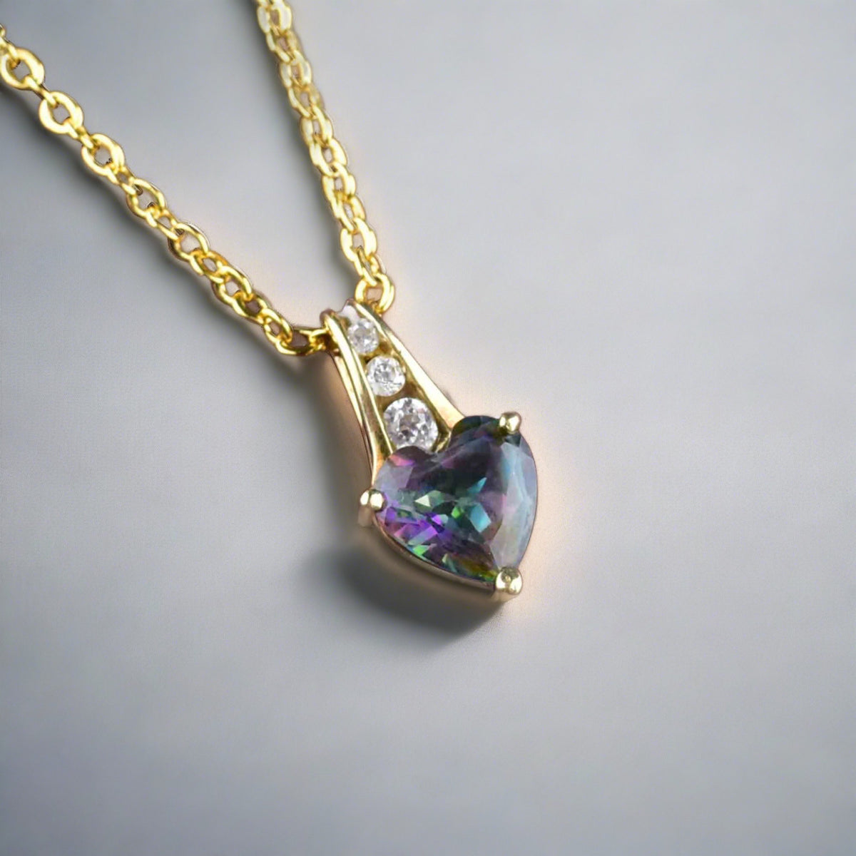 Vintage 10k yellow gold mystic topaz 2024 heart & cz pendant