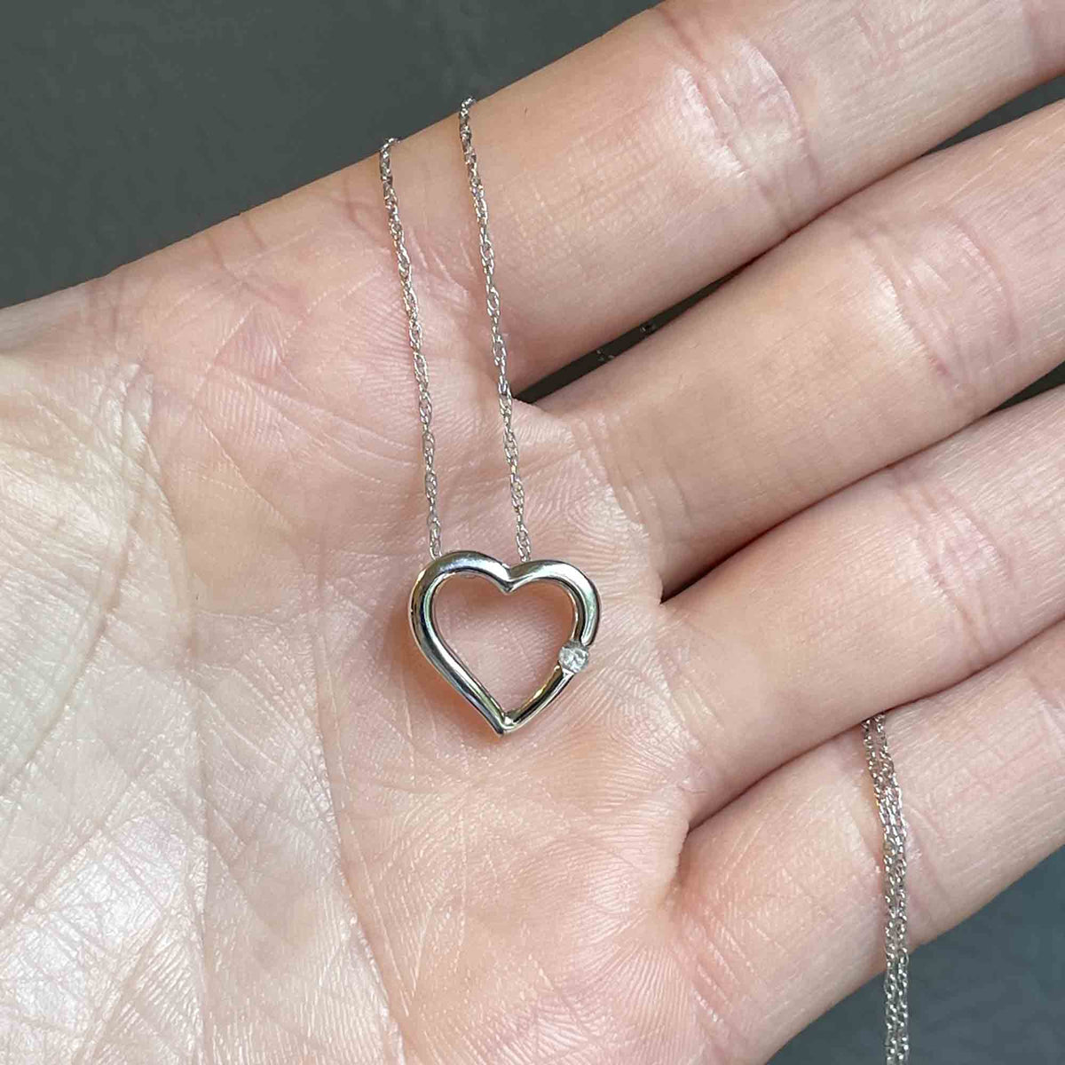 10k Adjustable Slide necklace. Beautiful heart charm with bead slider sold chain