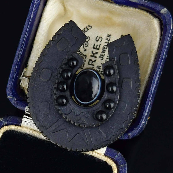 Antique Vulcanite Bullseye Agate Horseshoe Brooch