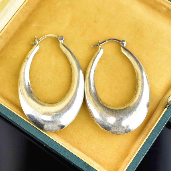 Silver hoop earrings in medium size