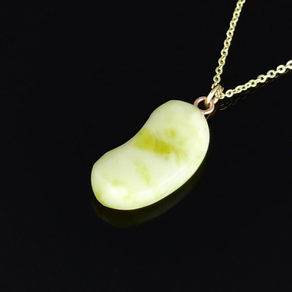 Vintage 9K Gold Carved Iona Marble Bean Charm Pendant