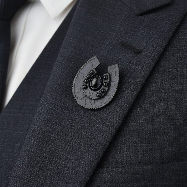 Antique Vulcanite Bullseye Agate Horseshoe Brooch