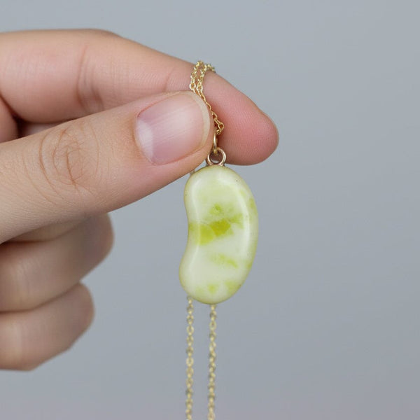 Vintage 9K Gold Carved Iona Marble Bean Charm Pendant