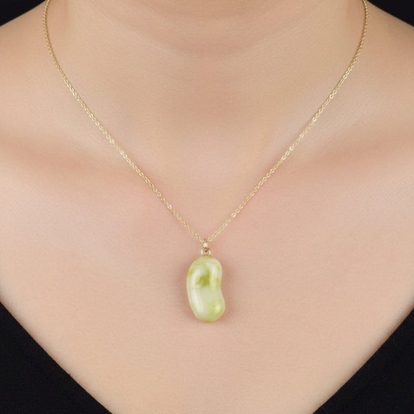 Vintage 9K Gold Carved Iona Marble Bean Charm Pendant