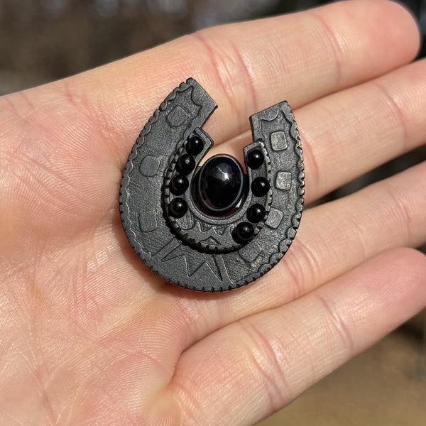 Antique Vulcanite Bullseye Agate Horseshoe Brooch