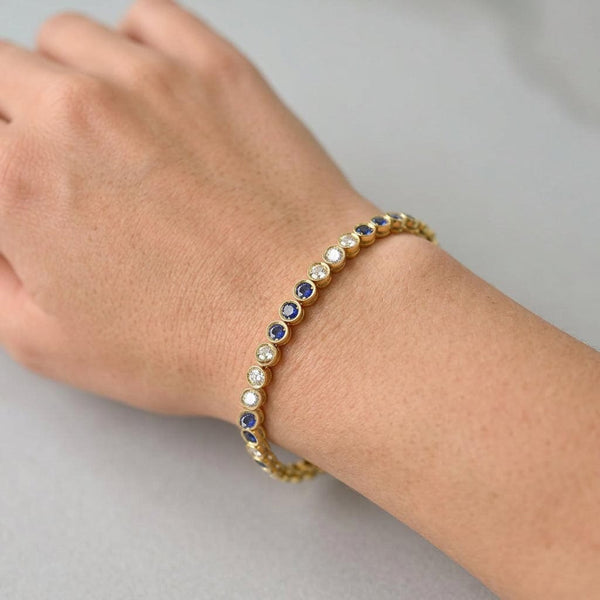 Vintage 18K Gold Sapphire and Diamond Tennis Bracelet