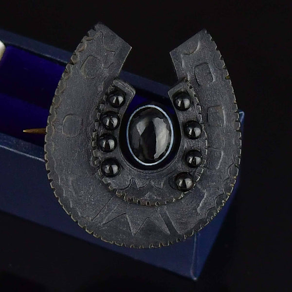 Antique Vulcanite Bullseye Agate Horseshoe Brooch