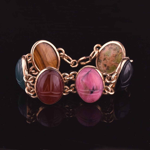 Sold at Auction: 14k gold scarab bracelet
