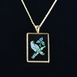 14k mosiac opal bird pendant. Stamped 585 which is factory 14k. Beautiful opals with lot