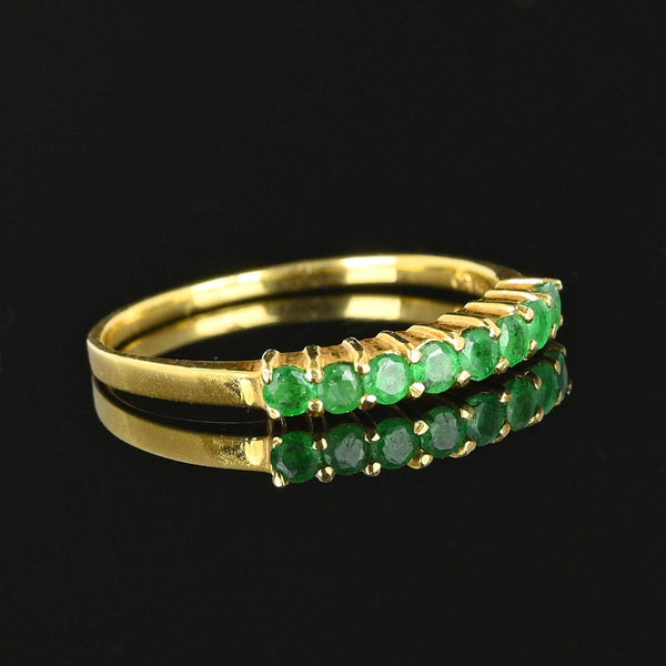 Emerald eternity deals ring yellow gold