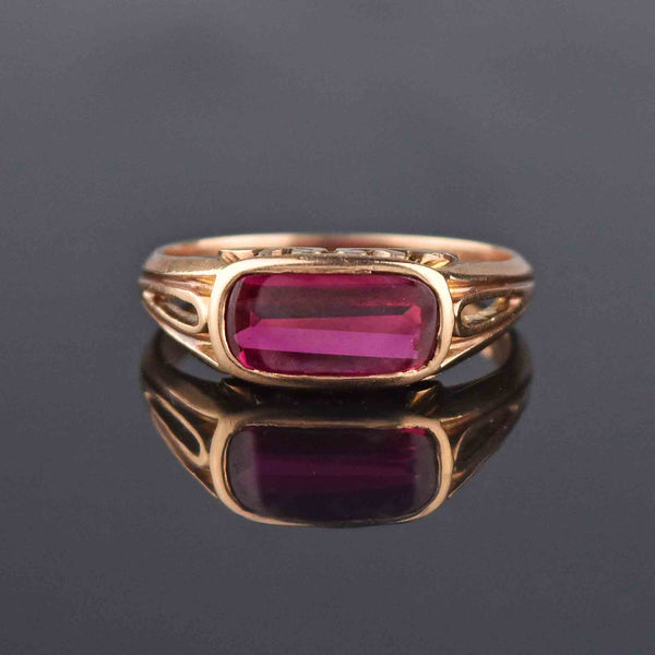 Natural ruby set on a 18k gold ring with diamonds